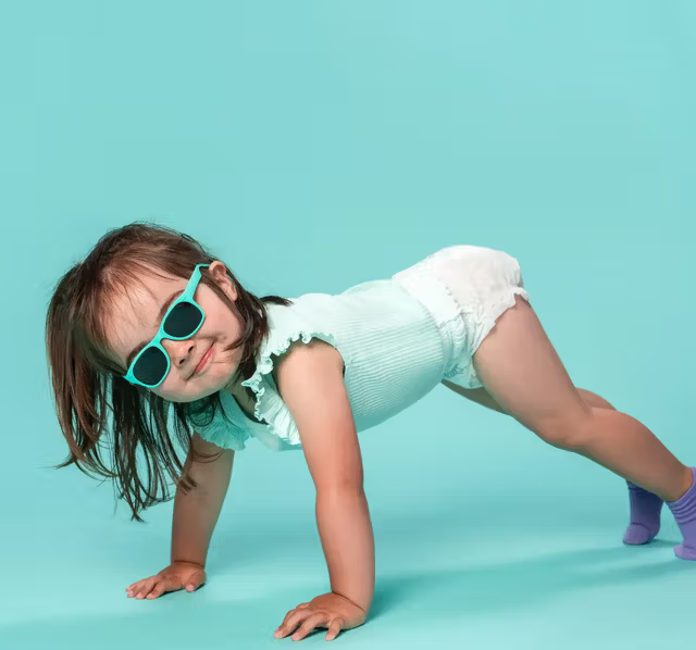 Child with Sunglasses Doing Handstand